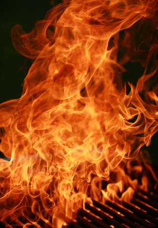Fire on a BBQ grillの写真素材