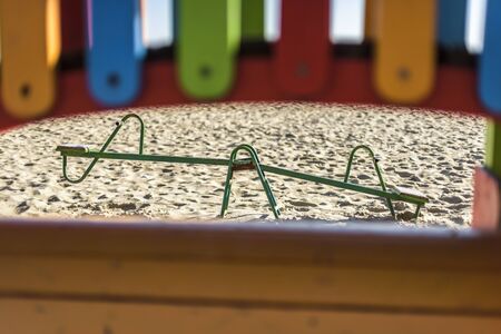 a green Seesaw on the beach framedの写真素材