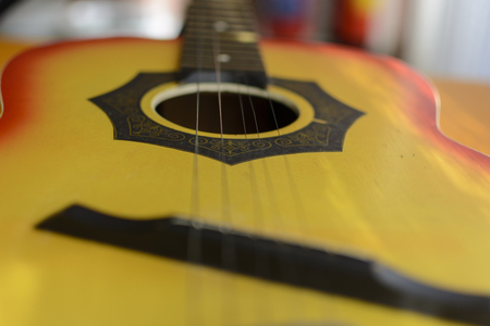 Guitar close up ,  blurry strings , Low depth of field.の写真素材