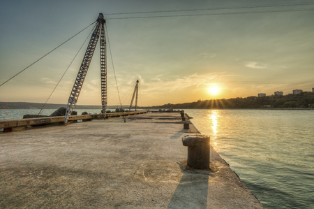 Sunset over Varna, with pylon for wake boardの写真素材