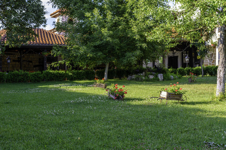 three wheelbarrow in a garden, garden decorationの写真素材