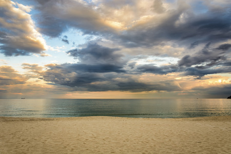 Beach at sunset, Dramatic clouds over the seaの写真素材