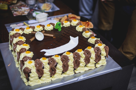 Cakes anniversary with chocolate an cream,     place for nameの写真素材
