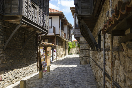 Old street in the city of Nessebar,bulgaria. traditional houses with pavement.の写真素材