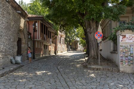 PLOVDIV,BULGARIA, AUGUST 20, 2018: Tourist visiting the old town street in the city of Plovdiv,Bulgaria.のeditorial素材