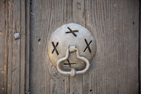 Very old wooden door knocker ,ancient doorの写真素材