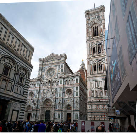Firenze, Italy, April 26, 2019: Tourist on the top of the cathedral Le Duomo, Santa Maria del Fiore visiting and taking panoramic photosのeditorial素材