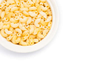 White bowl of tasty macaroni on white isolated background with soft drop shadowの写真素材