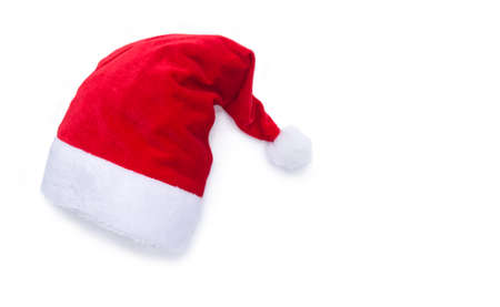 Red Santa Clause hat on white background with drop shadow and copy space for textの写真素材