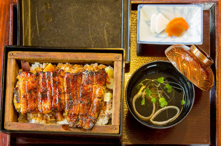 Japanese eel, rice, and miso soup serve in bento set at a famous Japanese restaurant