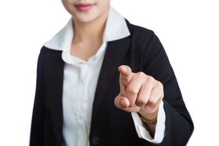 Female hand of business woman pointing index finger at viewer, or camera, with white backgroundの写真素材