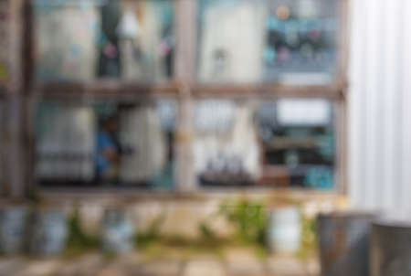 Blurred exterior of a shop windows on a bright cloudy dayの写真素材