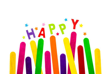 colorful wooden stick with wooden happy alphabet letters on white background, good for happy theme, room for text or copy spaceの写真素材