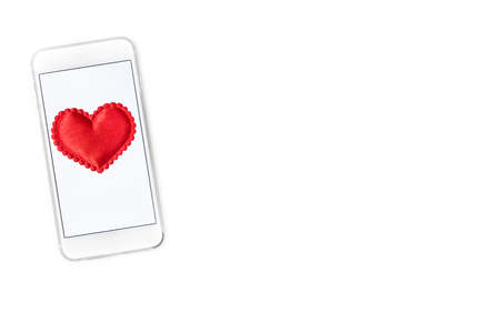 Smart phone with felt heart image in the center, on white background with room for text, good for...
