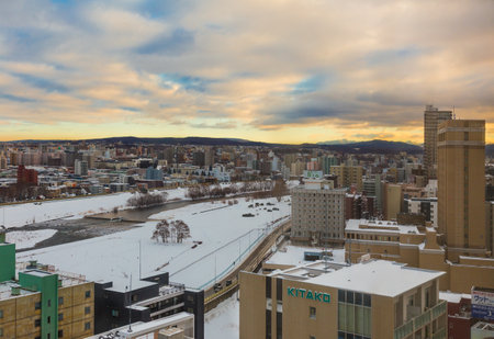 Otaru, Hokkaido, Japan - 30 December 2017 - View of city of Otaru covers with snow in the winter during beautiful sunset of December 30, 2017 in Otaru, Hokkaido, Japanのeditorial素材