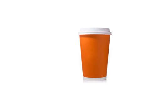 Orange coffee paper cup with white lid on white background with room for textの写真素材