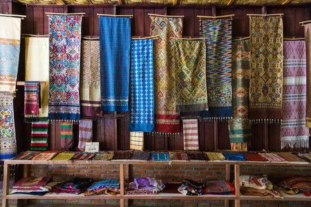 LUANG PRABANG, LAOS - 30 June 2018 - Hand woven fabrics are in display for sale at local shop in Luang Prabang, Laos on June 30 2018のeditorial素材