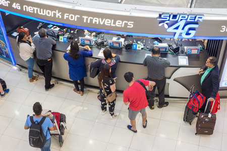 BANGKOK, THAILAND - 21 JULY 2018 - People wait to buy phone internet sim card at Dtac Super 4G...