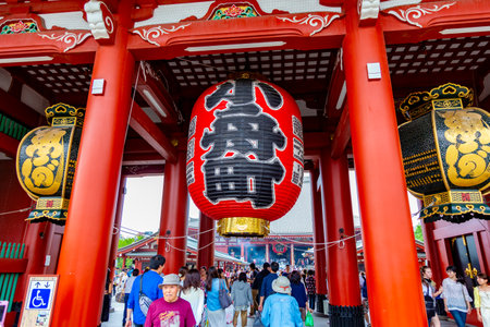 Asakusa, Japan - 13 June 2015 - Tourists and visitors walk around in front of the famous Asakusa temple entrance on June 13, 2015のeditorial素材