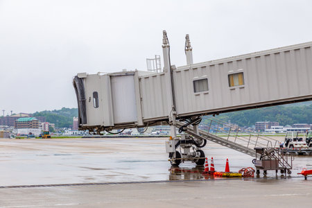 Fukuoka, Japan - 14 July 2019 -  Empty jet bridge or passenger boarding bridge at an airport in...