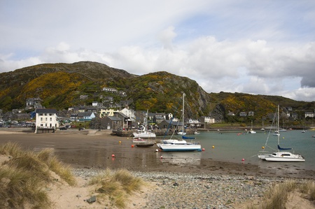Barmouth harbour North Wales Located on the coast of North Wales, with a long sandy beach and a picturesque harbour bordered by the dramatically beautiful Mawddach estuaryのeditorial素材