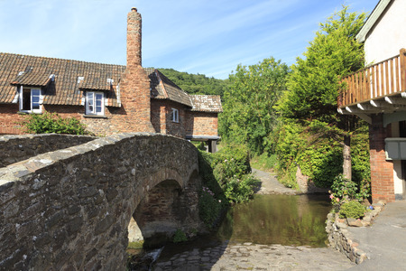 Bridge over the stream in Allerford, Somerset, UKの写真素材