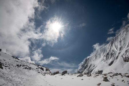 Snowy mountains in evening cloudy sky. Altayの写真素材