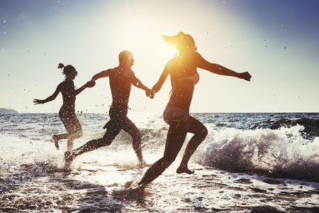 Happy friends beach sunny seaの写真素材