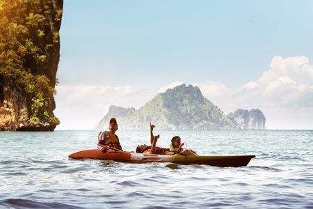 Happy family father mother son kayaking sea thailandの写真素材