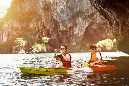 Family tourism travel kayak kayaking concept sea vacationsの写真素材