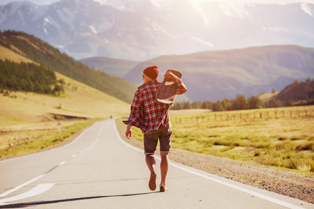 Man go straight mountain road skate longboardの写真素材