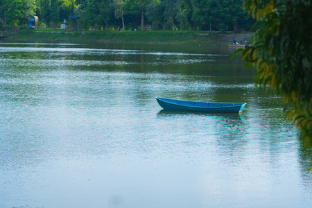 A boat on the dam of Tanjungan, Mojokerto. Indonesia. Copy space.の写真素材