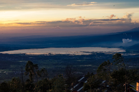 The landscape sunrise of the Rawapening against Merbabu Mountain in Central Java, Indonesia. Long...