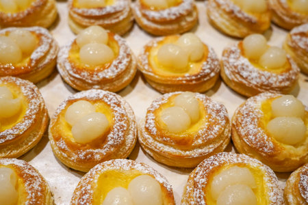 Croisants and cinnamon ro;;s in a display shelf for breakfastの写真素材