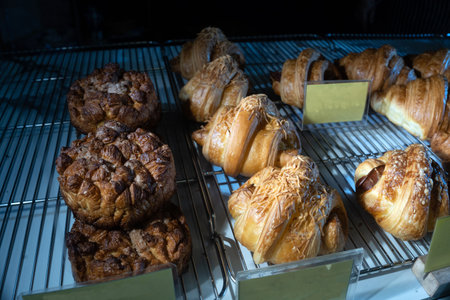 Close up of Freshly baked croissant on stainless steel tray. Food Photography.の写真素材