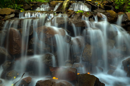 Landscape of multilevel waterfalls in Dlundung, Trawas, Mojokerto. Indonesia. Long Exposure Nature Photography.の写真素材