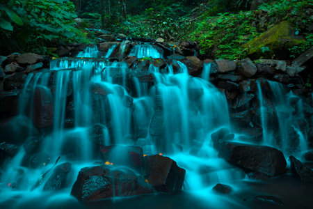 Landscape of multilevel waterfalls in Dlundung, Trawas, Mojokerto. Indonesia. Long Exposure Nature Photography.の写真素材