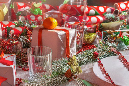 Christmas table decoration with gifts and ornaments. Christmas background.の素材