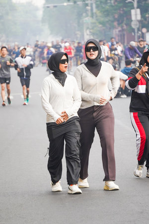 Unidentified people on the street in Car Free Day, Jakarta, Indonesia.