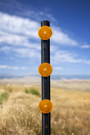 Traffic reflectors along roadside in Wyomingの写真素材