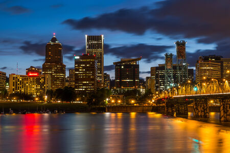 Colorful lights reflecting off the Willamette River in Downtown Portland, Oregonのeditorial素材