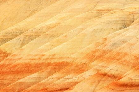 The Painted Hills Unit contains colorful geological layers of strata. The Painted Hills are located in John Day Fossil Beds National Monument in Eastern Oregonの写真素材