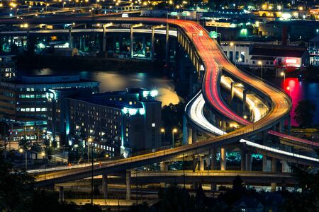 Portland, Oregon downtown and freeway at nightのeditorial素材