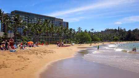 Sunbathers at Kalapaki Beach in the town of Nawiliwili on the island of Kauaiのeditorial素材