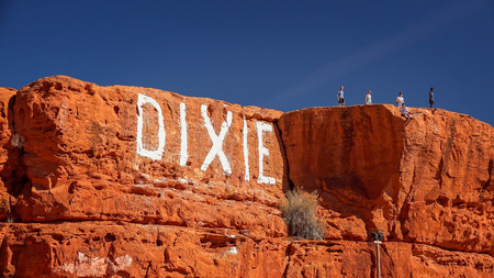 Tourists over look the town of St. George, Utah from Dixie Rock aka Sugarloaf.のeditorial素材