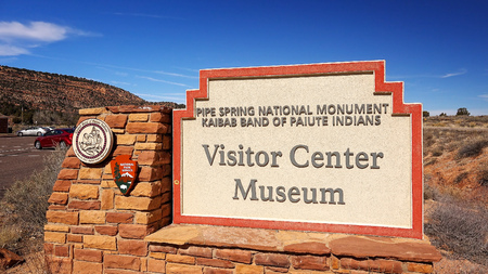 Visitor center and museum sign at entrance to Pipe Spring National Monumentのeditorial素材