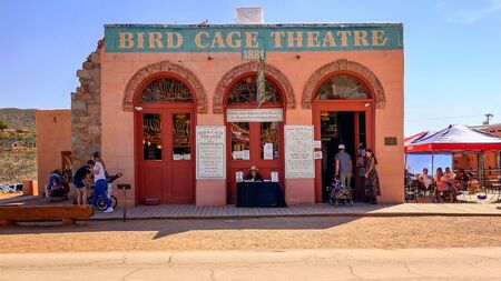 Historic Bird Cage Theatre as stagecoach passes by in the old west town of Tombstone, Arizonaのeditorial素材