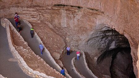 Tourists Hike the Natural Entrance Trail at Carlsbad Caverns National Park in New Mexico