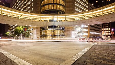 Busy intersection in downtown Houston, Texas at night with trafficのeditorial素材