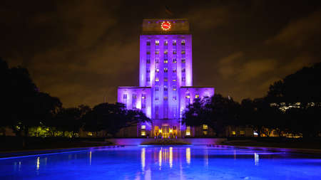 Houston, Texas City Hall building lit up at night with reflecting poolのeditorial素材